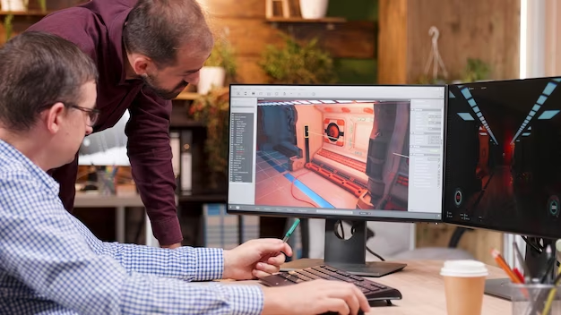 two people working on a computer